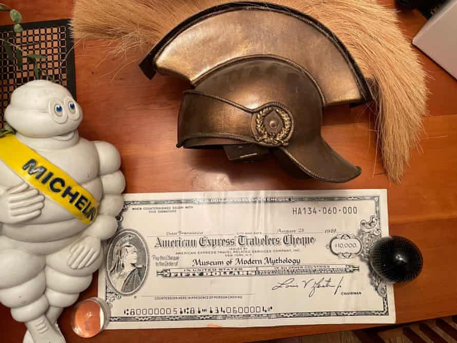 Michelin Man with centurion helmet and check from American Express