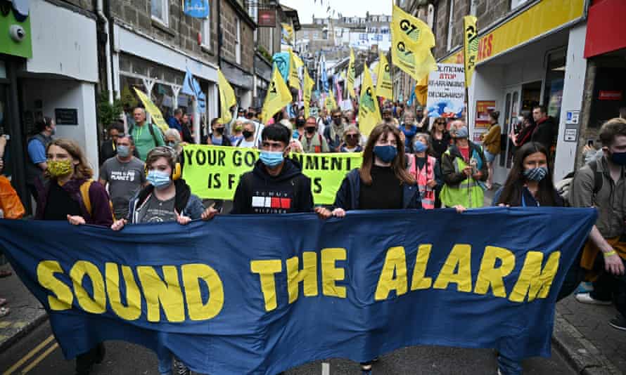 Extinction Rebellion activists take part in the ‘Sound The Alarm’ march during the G7 summit in Cornwall