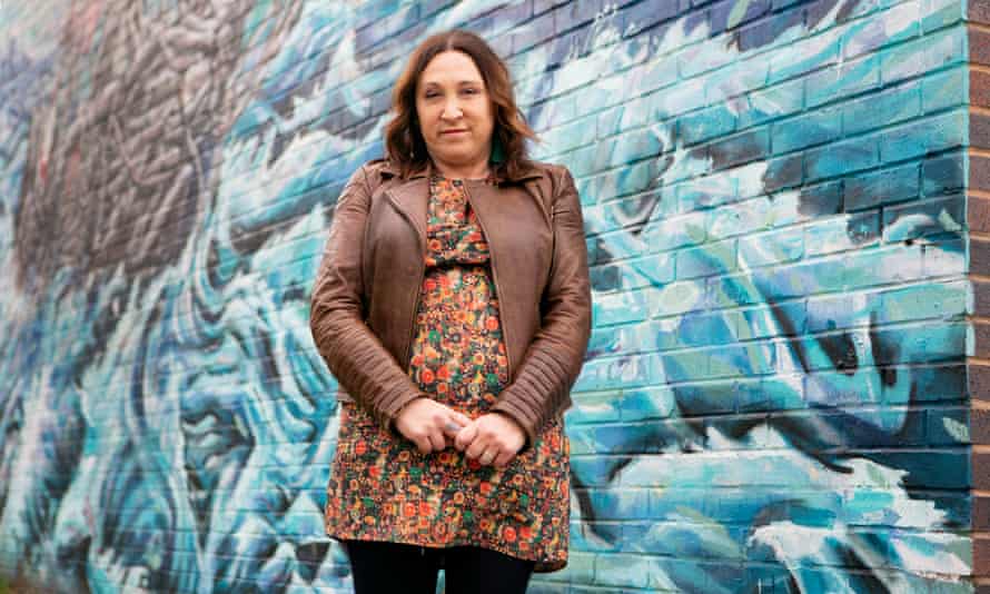Council leader Janette Williamson in front of a mural